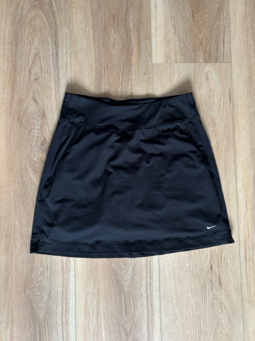 Nike 
Women’s Nike golf / tennis skirt with pockets and under shorts